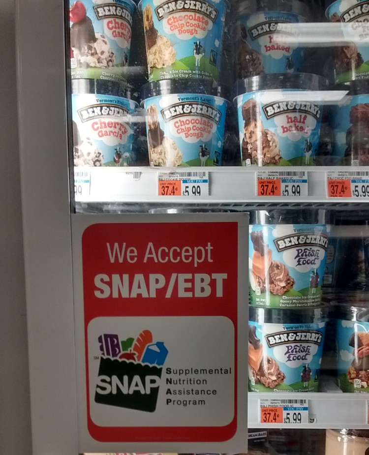 Oh snap! Why are we encouraging needy people to spend what precious funds they have for food on Ben and Jerry's?